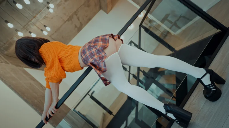 Seductive Creamy Spot in orange top and plaid skirt, bent over railing in white tights