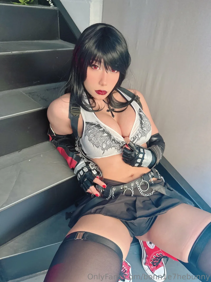 Hot bonn1e7hebunny in cosplay bra and short skirt, sitting on stairs with thigh highs