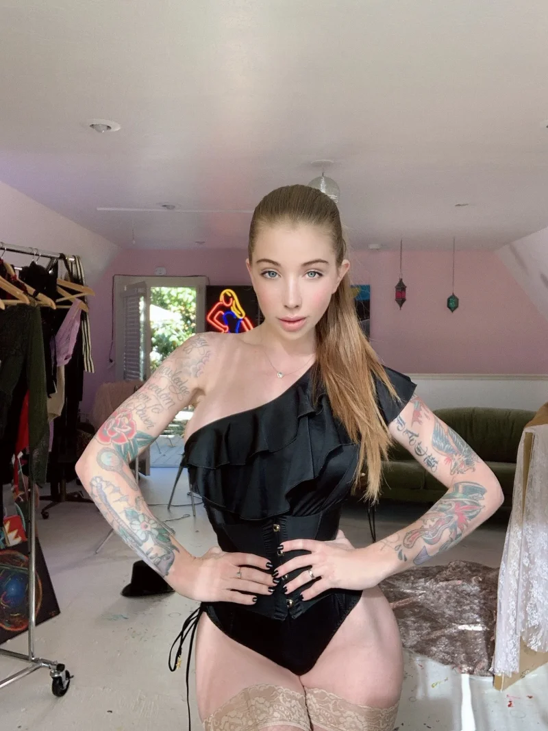 Sexy Coconut Kitty in black one-shoulder bodysuit with lace thigh highs, leak
